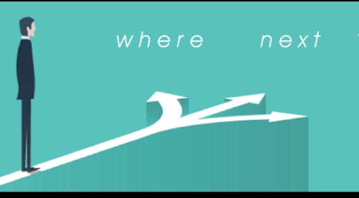 The image shows a man in a black suit standing on a white path that's leading to a cliff with three arrows pointing in different directions. The words "where next" are written above the arrows in white text against a teal background.