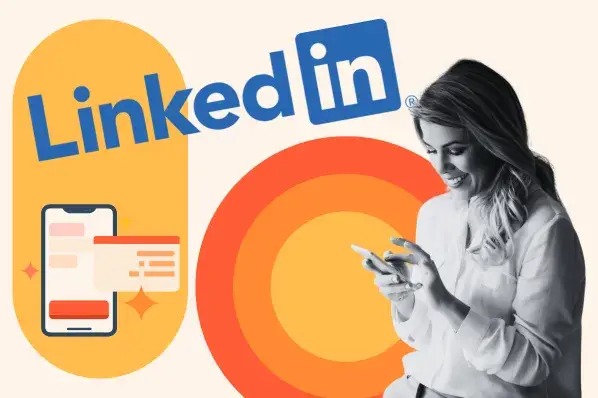 The image depicts a woman holding a smartphone and looking at it while standing next to prominent visual elements that include:

1. The LinkedIn logo (blue “LinkedIn” text with a blue square icon containing a white lowercase “in”).
2. A yellow oval background with an illustration of a mobile phone displaying a chat or notification screen with a red banner and a white message box.
3. A large orange circular gradient graphic behind the LinkedIn logo.

The overall design suggests a promotional or informational context linking LinkedIn with mobile usage or networking on the platform.