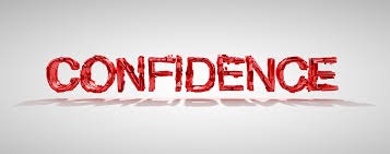 Alt text: The word "CONFIDENCE" written in bold, red, slightly rough-textured letters on a white background, with a subtle shadow underneath.